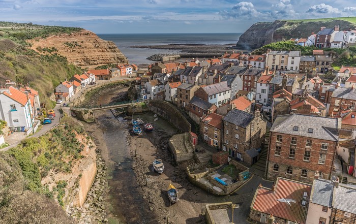 Staithes, England village with river and sea