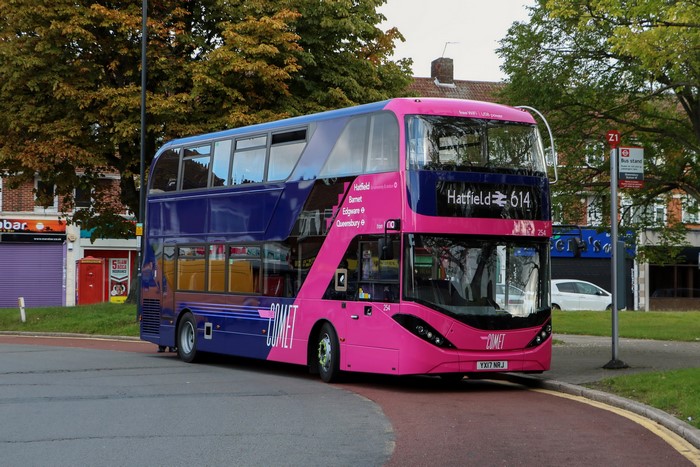 Pink and blue double-decker bus route 614