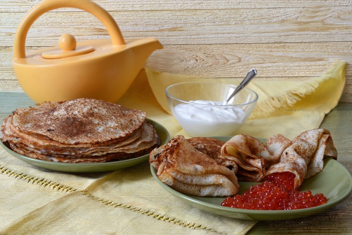 Pancakes with caviar and sour cream