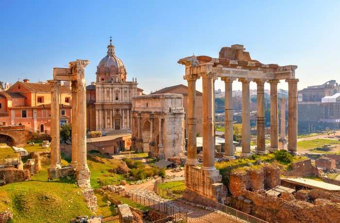 Roman Forum ruins with Arch of Septimius Severus and church dome