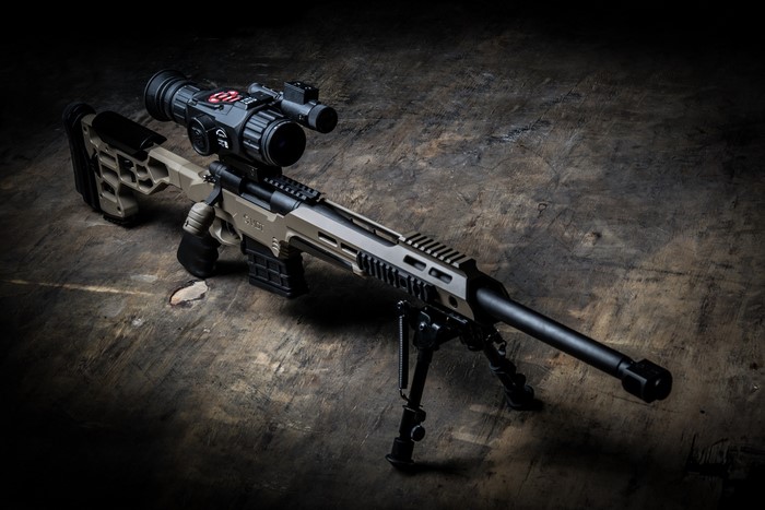 Sniper rifle with telescopic sight and bipod
