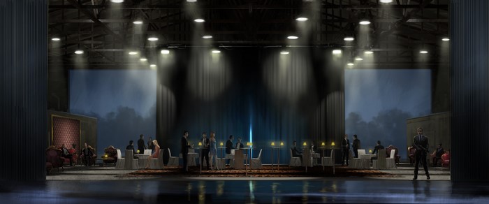 Men in a dimly lit event hall