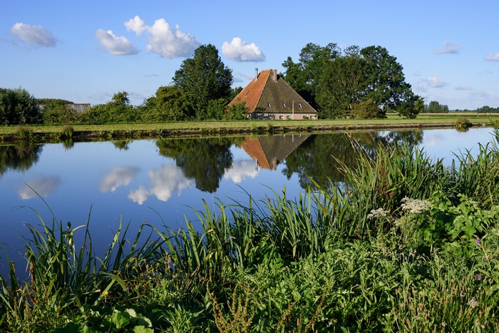 Farmhouse by a canal in the Netherlands