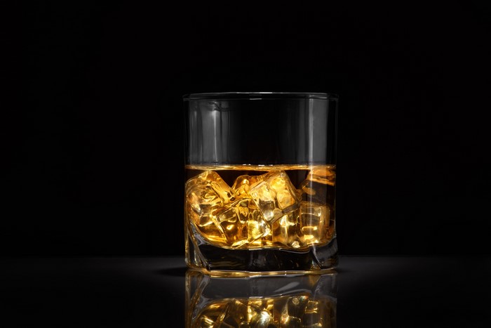 Whisky with ice in a glass