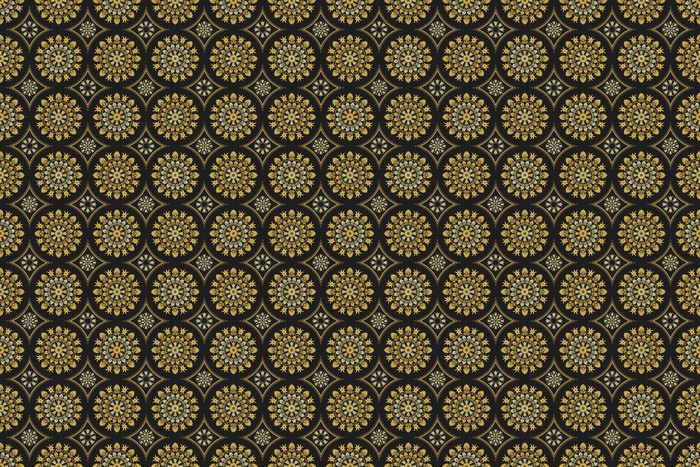 Gold circular floral pattern on black background