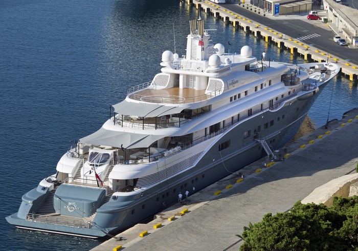 The luxury yacht Radiant docked at a harbor