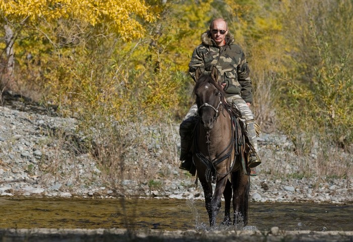 Vladimir Putin Riding Horse in Autumn Forest