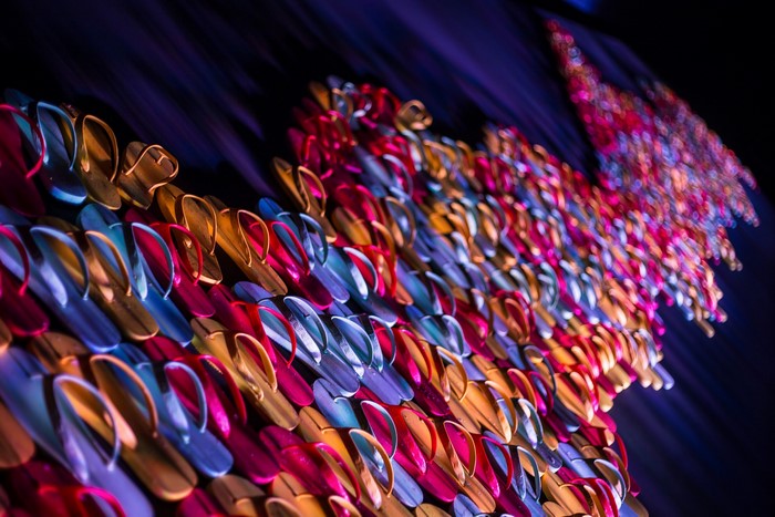 Wall of colorful flip-flops