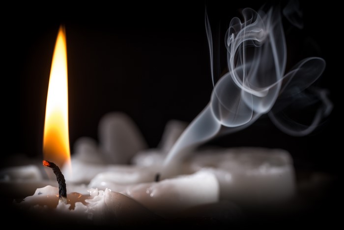 Candle flame and smoke