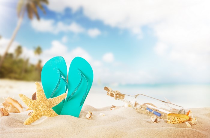 Starfish, Flip-flops, and Message in a Bottle on a Beach