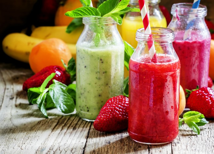 Strawberry Smoothie in Bottles with Fruits