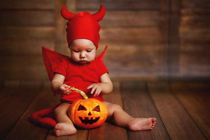Baby in Devil Costume with Halloween Pumpkin