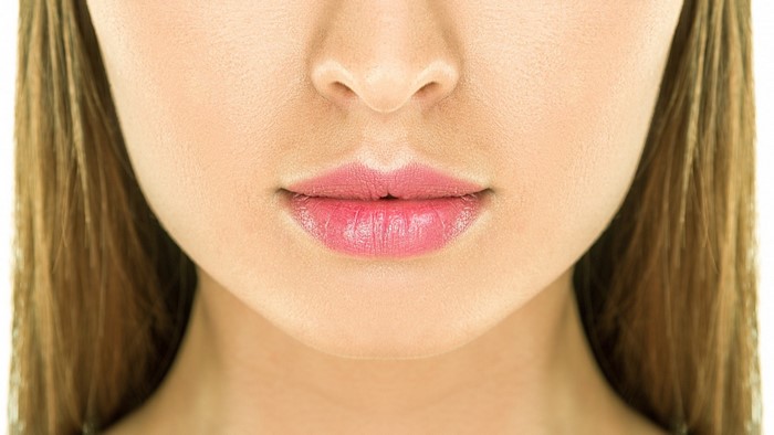 Close-up of a woman's lips and nose