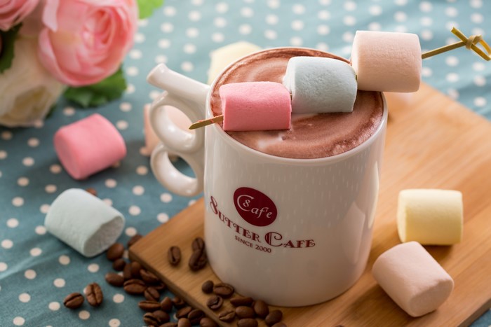 Hot chocolate with marshmallows in a Butter Cafe mug