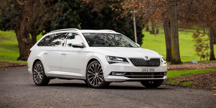 White Skoda Superb Estate car