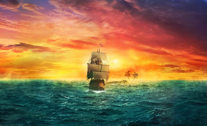Sailboat sailing on the sea at sunset