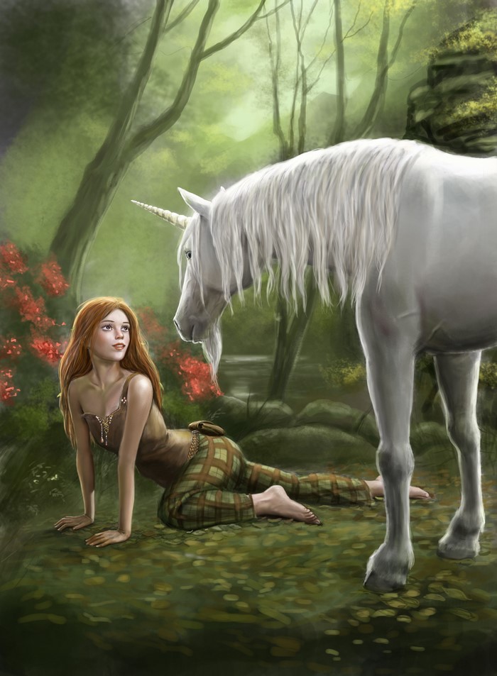 Girl and unicorn in a forest