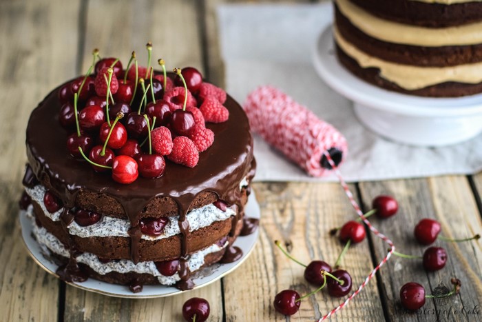 Chocolate cake with cherries and raspberries