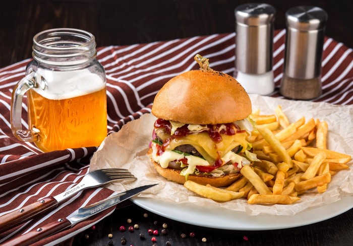 Hamburger with french fries and beer