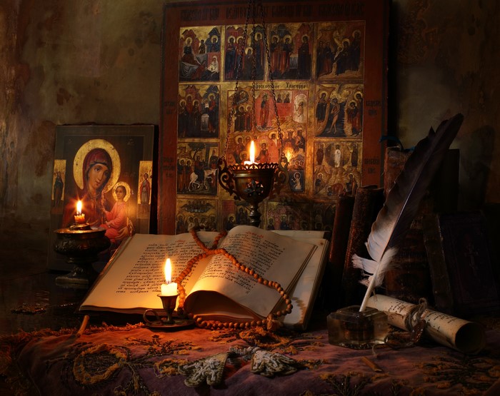 Religion and study with candles and icons