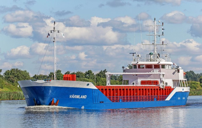 The cargo ship VÄRMLAND sailing on a river