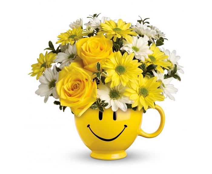 Yellow Roses and Chrysanthemums in a Smiley Face Mug