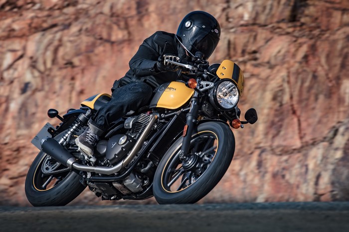 Triumph Motorcycle Rider on a Road