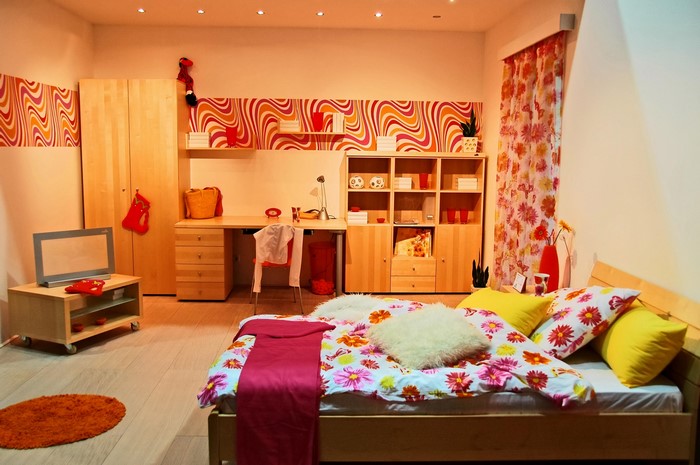 Children's room with bed, desk, and wardrobe