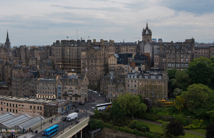 Edinburgh cityscape with historic buildings and a double-decker bus