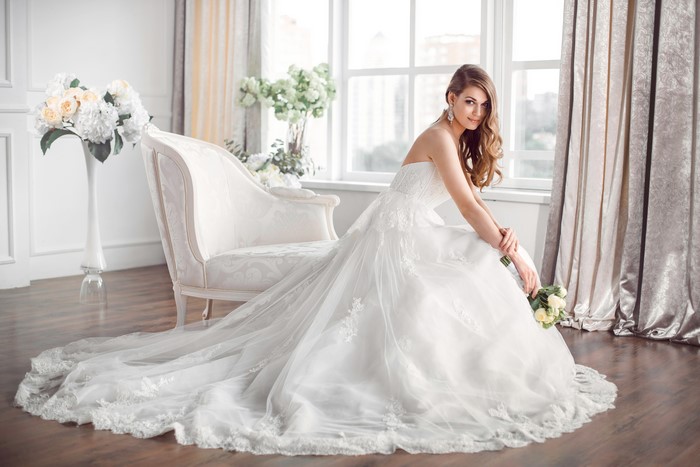 Bride in a white dress with flowers