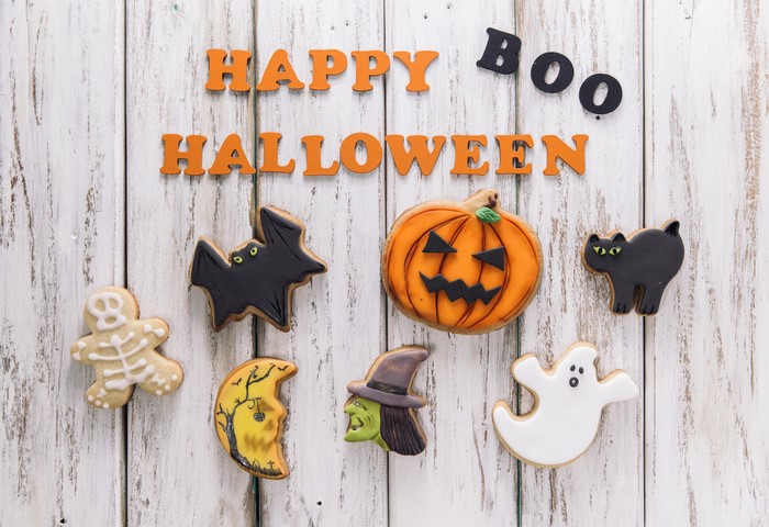 Happy Halloween Cookies on Wooden Background