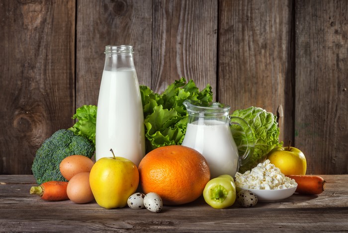 Still-life of dairy products, eggs, fruits, and vegetables