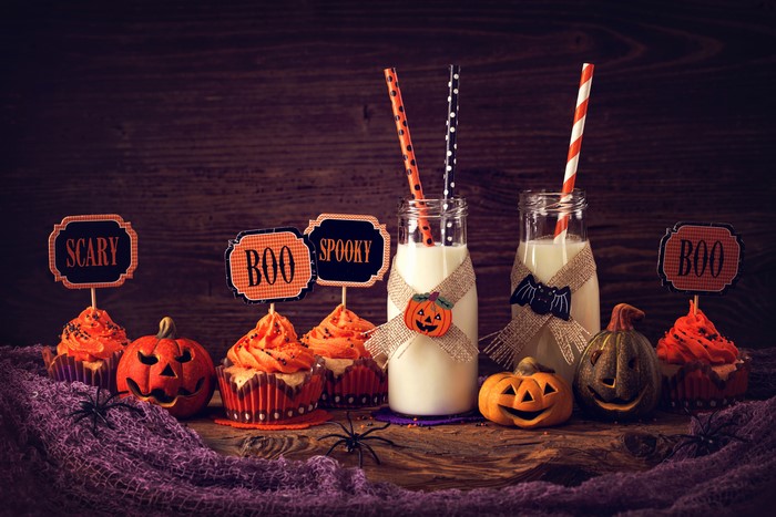 Halloween cupcakes and milk bottles with pumpkins