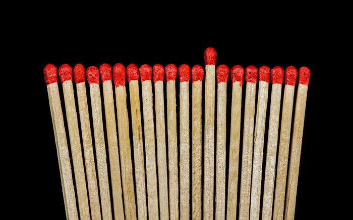 Matches with red tips on black background