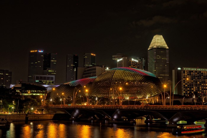 Singapore skyline at night with Esplanade and bridge