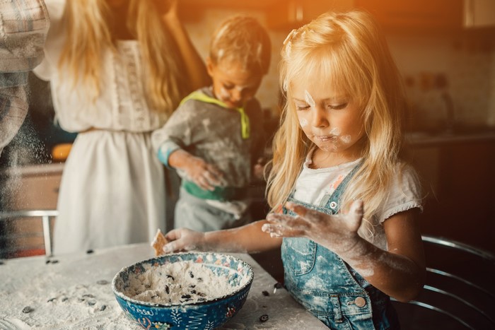 Children baking with flour