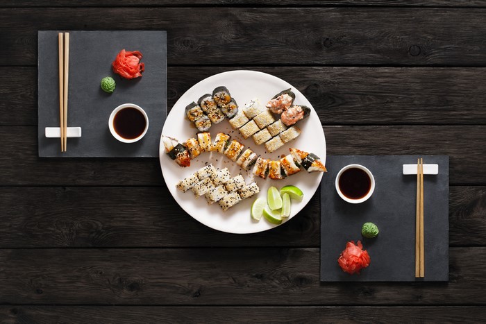 Sushi platter with chopsticks and soy sauce