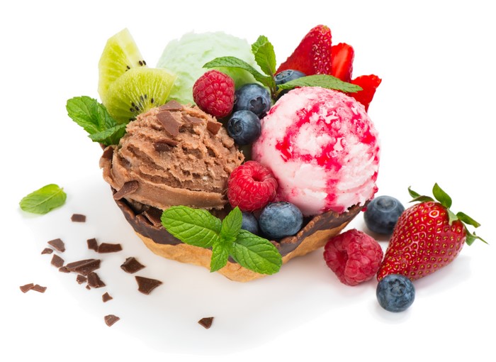 Ice cream sundae with berries and kiwi