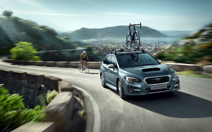 Subaru Levorg with bicycle on roof rack