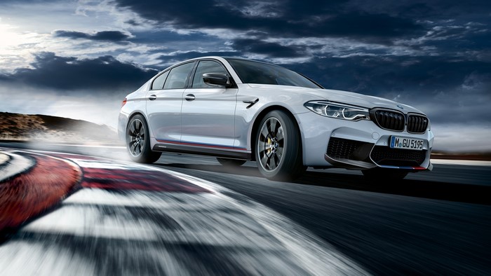 White BMW M5 M Performance on a Racetrack