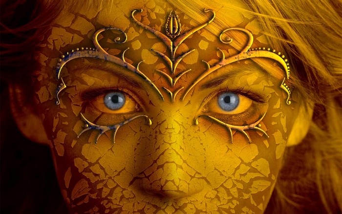 Woman with golden cracked face and blue eyes