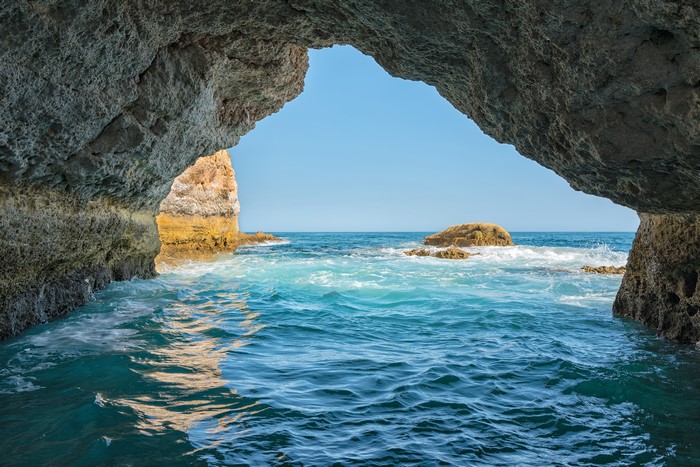 Cave entrance overlooking the sea in Algarve, Portugal