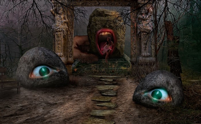 Surreal scene with giant eyes and a mouth rock