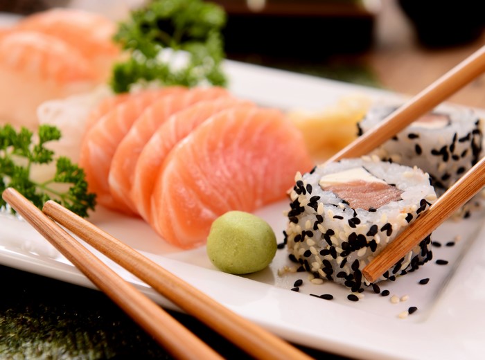 Sushi and Sashimi Platter with Chopsticks