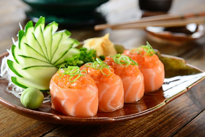 Salmon Sushi with Cucumber Garnish