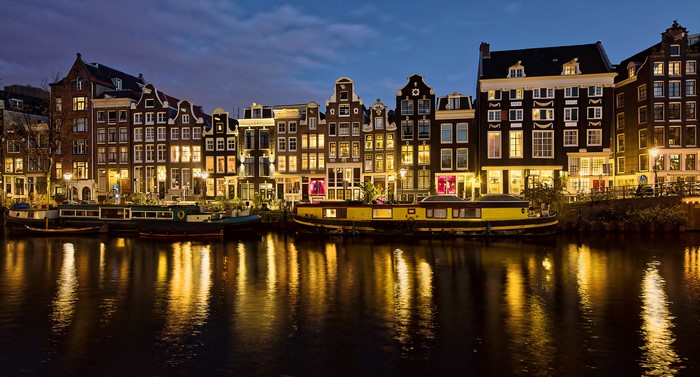 Amsterdam Canal Houses at Night with Reflections