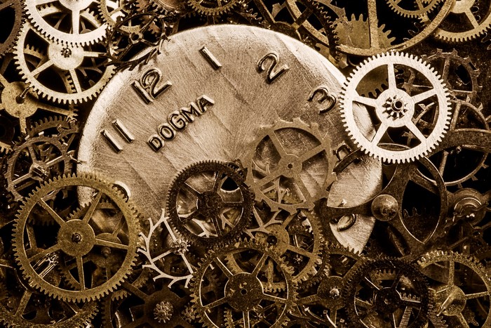 Clock face with gears and the word DOGMA
