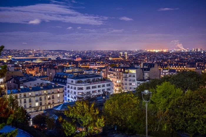 Paris cityscape at night with lights and buildings