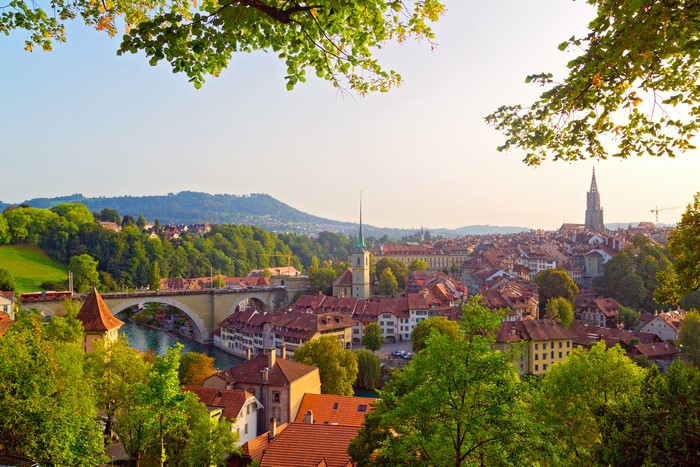 Bern, Switzerland cityscape with river and bridge