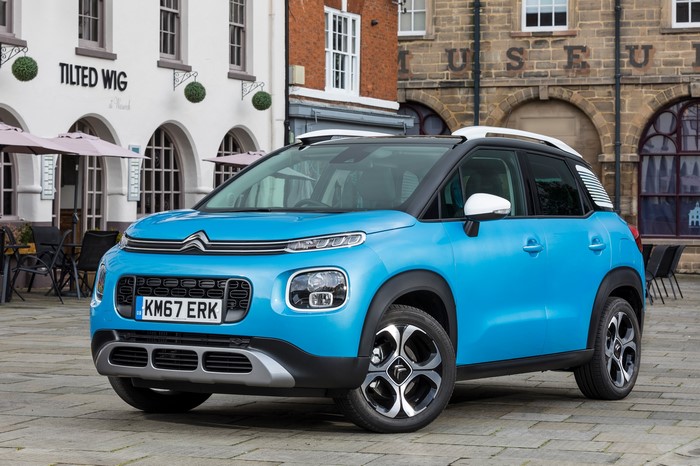 Citroen C3 Aircross parked in front of a building
